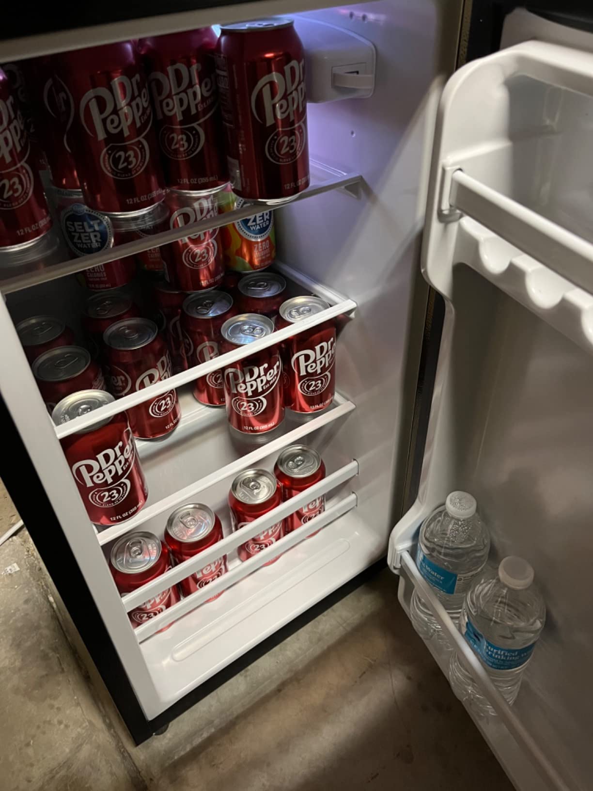 Anukis customer photo — retro mini fridge in a styled bedroom