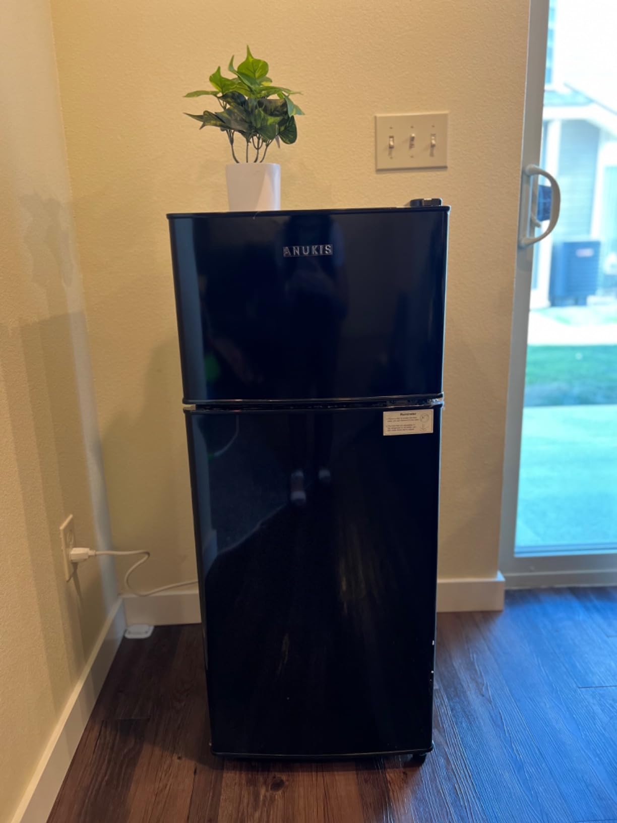 Anukis customer photo — compact refrigerator in a home office