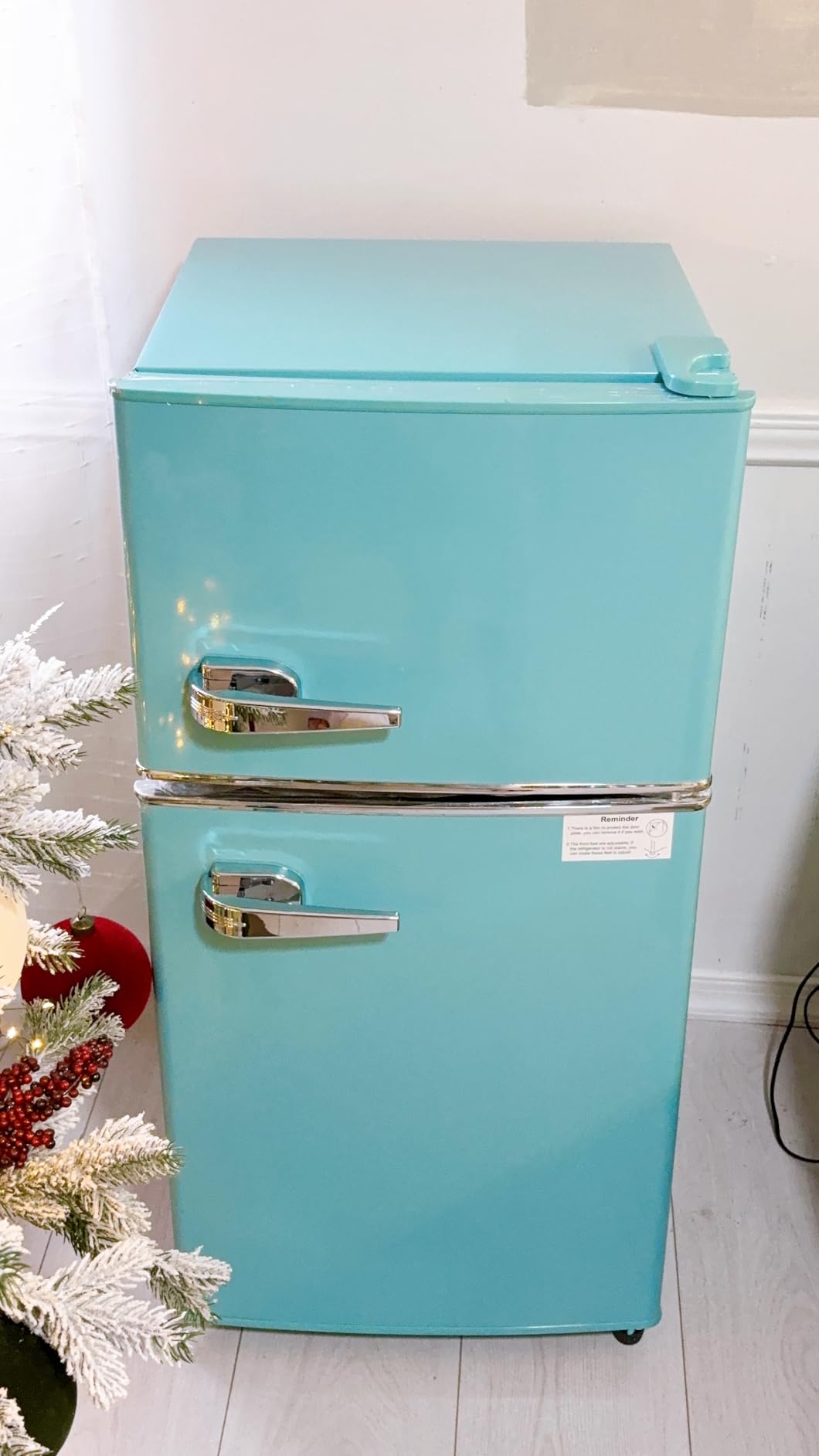 Anukis customer photo — retro fridge next to a Christmas tree