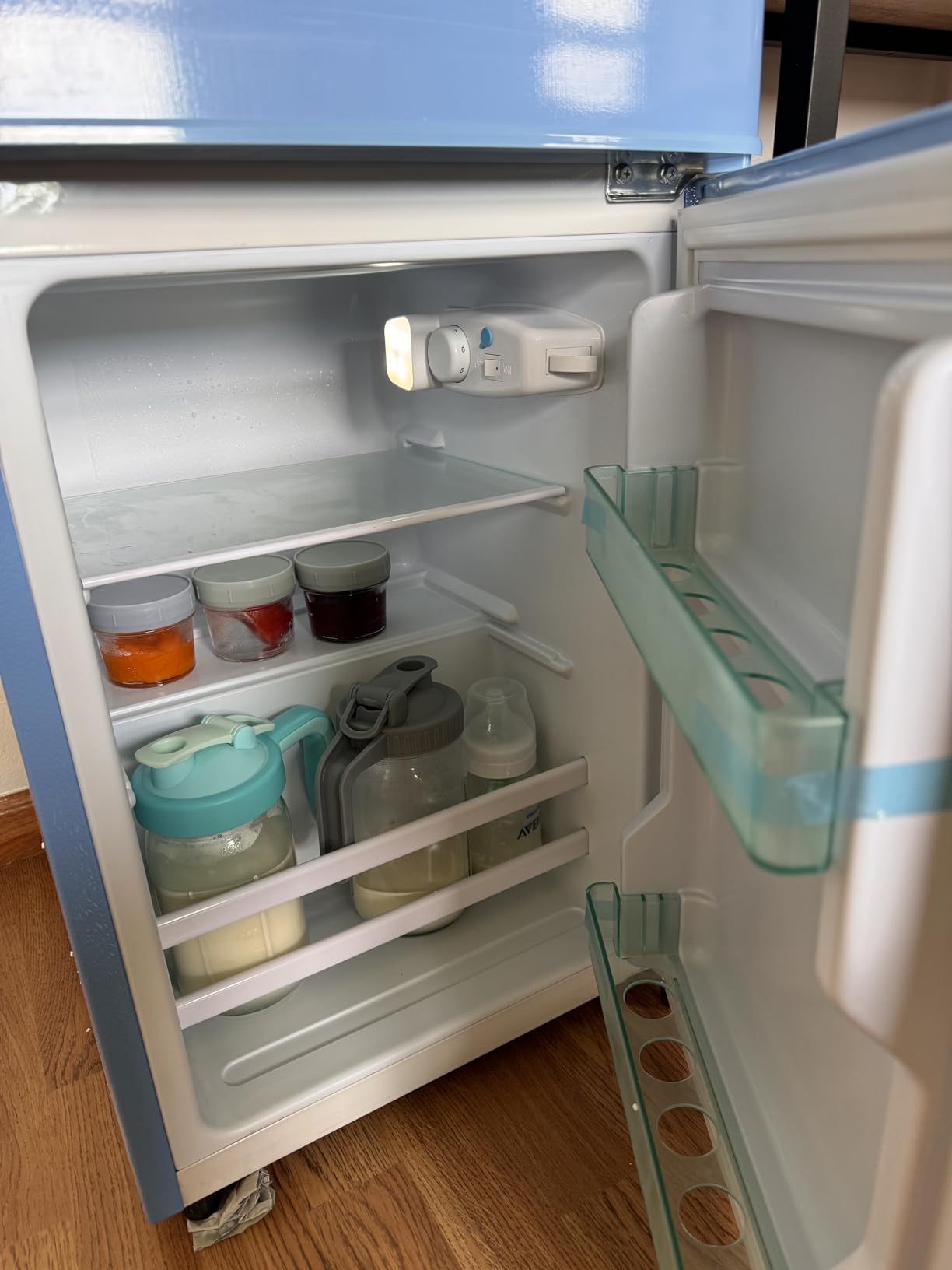 Anukis customer photo — compact fridge in family room